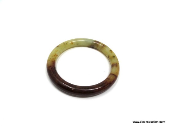 SUBSTANTIAL JADE BANGLE BRACELET. INSIDE DIAMETER MEASURES 2 3/8 IN, AND IT IS 5/8 IN THICK. TOTAL
