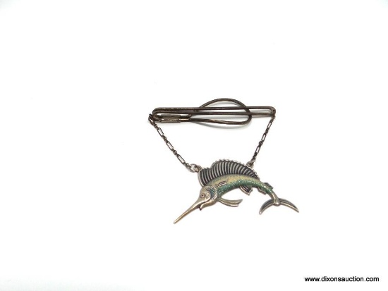 VINTAGE TIE BAR CLIP THAT SUSPENDS A STERLING SILVER JUMPING MARLIN. THE BAR ITSELF MEASURES 2.75