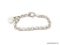 STERLING SILVER - .925 LADIES SOLID CABLE LINK HEART BRACELET. TOTAL WEIGHT 25.5 GRAMS