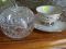 (DR) FLINT RIDGE CHINA CUP AND SAUCER SET, AND CUT GLASS APPLE DISH WITH LID.