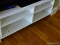 (LR) WHITE ENTERTAINMENT SYSTEM SHELF; BENCH-CRAFTED AND PAINTED, ON 4 WHEELS. HAS 4 COMPARTMENTS