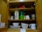 (K) KITCHEN CABINET LOT; INCLUDES UPPER CABINET CONTENTS SUCH AS COFFEE MUGS, PLATES, BOWLS, ROCKS