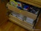 (K) LOWER CABINET LOT; CONTENTS OF LOWER CABINET, INCLUDING PLASTIC KITCHEN STORAGE WARE, BAGS,