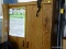 (GAR) WOOD GRAIN WARDROBE/ STORAGE CABINET; HAS TWO FRONT DOORS WITH HANGING BAR INSIDE FOR CLOTHES,