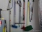 (GAR) GARAGE WALL LOT; INCLUDES ITEMS HANGING SUCH AS MOPS, SWEEPERS, BROOMS, SNOW SHOVEL, SQUEEGEE,