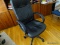 (OFF) ROLLING BLACK LEATHER OFFICE CHAIR; HIGH BACK WITH ARMRESTS. 5 LEGS WITH SMOOTH ROLLING