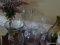(FOY) VASE LOT; INCLUDES 6 GLASS VASES OF ASSORTED SIZES, AS WELL AS ONE GLASS MILK BOTTLE STYLE
