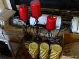 (LR) PILLAR CANDLES LOT; 10 CANDLES, 1 SCENTED PAULA DEEN CANDLE, 6 CANDLE STANDS, ONE 2-SHELF WIRE