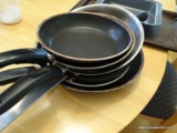 (K) FRYING PAN LOT; INCLUDES ASSORTED SIZE PANS FROM IKEA, TRI PLY CLAD, AND MORE. 5 TOTAL PIECES.