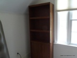 (UP) WOODGRAIN BOOKCASE; MEDIUM BROWN IN COLOR WITH 2 ADJUSTABLE OPEN SHELVES AND A STORAGE CABINET