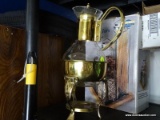 (GAR) GLASS PITCHER WITH BRASS TRIM AND STAND TO HOLD CANDLE/STERNO. ALSO, SET OF GLASS STORAGE JARS