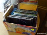 (TAB) TABLE LOT; MULTICOLORED STORAGE BOX AND OVER 20 JEWEL CASES FOR CD'S AND REWRITABLE DVDS.