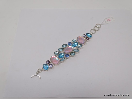 VERY ATTRACTIVE HANDMADE SILVERTONE BRACELET WITH GEMSTONES. TOGGLE CLASP. MEASURES 8.5 IN
