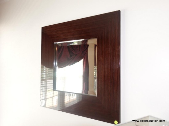 (LR) 1 OF A PAIR OF MODERN FRAMED AND BEVELLED GLASS MIRRORS: 27" X 27"