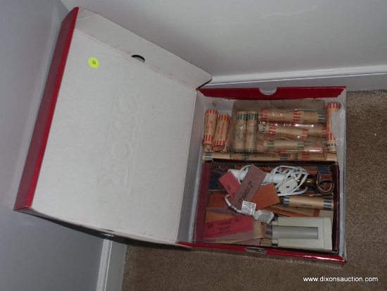 (BR2) SHOE BOX FILLED WITH COIN WRAPPERS AND A COIN WRAPPER HOLDER FOR EASE OF COIN INSERTION.