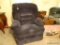 (LR) RECLINER BY LANE FURNITURE COMPANY; DARK BLUE PLUSH RECLINER WITH TUFTED BACK, PLEATED SEAMS,