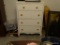 (BR3) WHITE CHEST OF DRAWERS; 4 DRAWERS WITH ROUND PINK AND GREEN FLORAL KNOB PULLS ON EACH DRAWER.