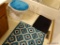 (BATH) ALL BATHROOM ACCESSORIES FROM HALLWAY BATHROOM; INCLUDES SCATTER RUGS AND TOILET SEAT COVER.
