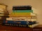 (LR) MANTEL BOOK LOT; 10 ASSORTED HARD AND SOFT COVERED BOOKS ABOUT SPACE, STARS, ASTRONOMY, AND