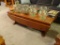 (LR) DROP LEAF SIDE COFFEE TABLE WITH TRESTLE BASE; MATCHES LOT #60. PEG-CONSTRUCTION FROM VERY