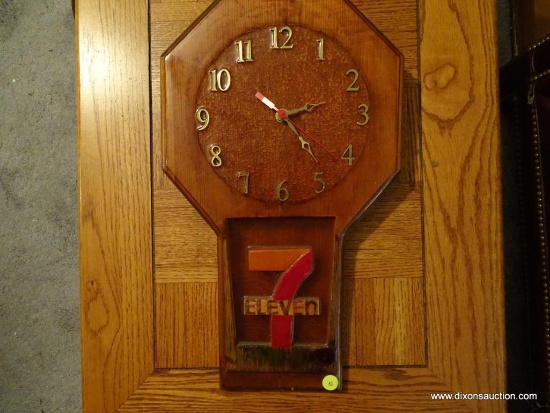 (LR) 7-ELEVEN WALL CLOCK; CRAFTED BY HAND, THIS VINTAGE 7-ELEVEN WALL CLOCK HAS AN OCTAGON SHAPED