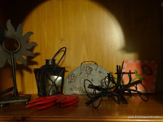 (LR) SHELF LOT; INCLUDES ASSORTED BLACK METAL DOLL STANDS, IRON SUN AND LANTERN CANDLE HOLDERS,