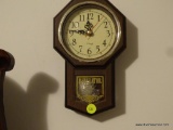 (MBR) TOZAI MINI VERSION OF TRADITIONAL OCTAGONAL WALL CLOCK; PLASTIC WITH PRINTED WOOD GRAIN,