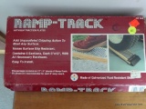 (BR2) RAMP-TRACK ANTI-SLIP TRACTION PLATES; IN ORIGINAL BOX. MODEL #RT-100.