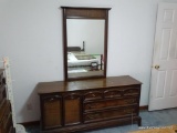 (BR2) MID-CENTURY MODERN MIRRORED DRESSER; 2 PANELED DOORS ON LEFT SIDE CONCEAL 3 PULL-OUT DRAWERS.