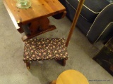 (LR) WOODEN FOOTSTOOL; COVERED IN A BROWN FABRIC WITH LIGHT PINK FLORAL PRINT, WITH AN ADDED WAIST