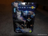 (LR) STAR TREK ACTION FIGURE ?COMMANDER DEANNA TROI? FROM THE FIRST CONTACT SERIES. BRAND NEW IN THE