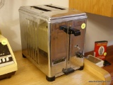 (K) RETRO TOASTER BY TOASTMASTER; 2-SLICE CAPACITY, VERY HEAVY WITH LARGE GREEN CORD. MODEL UNKNOWN,