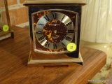 (LR) HOWARD MILLER BRASS MANTEL CLOCK; VERY HEAVY, RECTANGULAR WITH SMALL HANDLE AT TOP, MODEL