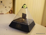 (K) PHILIP MORRIS PYRAMID CLOCK; BLACK AND CLEAR PLASTIC WITH ROTATING FLAG INSIDE. BATTERY OPERATED