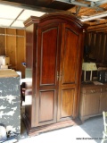 (GAR) CHERRY 2 DOOR ARMOIRE WITH UPPER ROD FOR HANGING CLOTHES, ADJUSTABLE SHELVES, 4 STORAGE HOLES