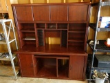 (GAR) LARGE CHERRY FINISH OFFICE DESK AND STORAGE UNIT; 4 MAGNETIC DOORS ON TOP CONCEAL STORAGE