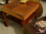 (LR) SIDE TABLE; OAK SQUARE TABLE WITH LOWER STORAGE SURFACE. TOP HAS QUARTERED INLAY DESIGN,