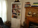 (LR) WHITE PAINTED BOOKCASE WITH LOWER CABINET; 3 ADJUSTABLE INTERIOR SHELVES REST ATOP A LOWER
