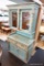 (R2) ANTIQUE CHIPPY BLUE PAINTED WOODEN CABINET; MOULDED TOP EDGE WITH 2 GLASS FRONT DOORS AND 3