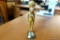 (R3) EGYPTIAN FIGURINE DEPICTING HATHOR, THE GODDESS OF LOVE STANDING ON A BLACK BASE; GOLD PAINTED