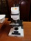 (R4) MICROSTAR IV LAB-QUALITY MICROSCOPE; MODEL #410, LIGHT GREY AND BLACK IN COLOR, 120 VOLTS, 60