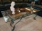 (R4) GLASS TOP COFFEE TABLE; BEVELED GLASS TOP SURFACE WITH GREEN WEATHERED WROUGHT IRON SCROLLING