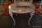 (R5) WROUGHT IRON SIDE TABLE; WITH TEXTURES ROUND GLASS TOP, 4 LEGS WITH FLORAL DETAIL, AND IRON