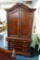 (R1) ELEGANT MAHOGANY ARMOIRE; ARCHING MOLDED TOP WITH CARVED FAN LEAF DETAIL, 2 TOP SIDE BY SIDE