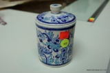 (R2) SMALL TURKISH PORCELAIN HAND PAINTED JAR; WHITE WITH BLUE FLORAL PATTERN, CYLINDRICAL WITH LID,