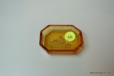 (R2) SMALL YELLOW GLASS SNUFF BOX; LONG OCTAGON SHAPE WITH CARVED CHERUBS IN CENTER. MEASURES JUST