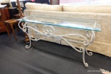 (R2) GLASS TOP SOFA TABLE; WROUGHT IRON SCROLLING FRAME WITH A WHITEWASHED FINISH. MEASURES 56 IN X
