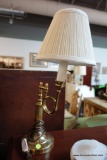 (R3) PORTABLE DESK LAMP; COILED GOLD TONE PIPE CONNECTS TO A REEDED COLUMN OVER A ROUND BASE. MINI