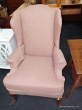 (R4) CLASSIC PINK WINGBACK CHAIR BY VANGUARD FURNITURE CO.; WINGED SIDES, ROLLED ARMS, AND QUEEN