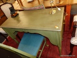 (R5) GREEN PAINTED WOODEN DESK; CARVED TRIM ON THE APRON SURROUNDING THE KNEE HOLE ON FRONT, AND